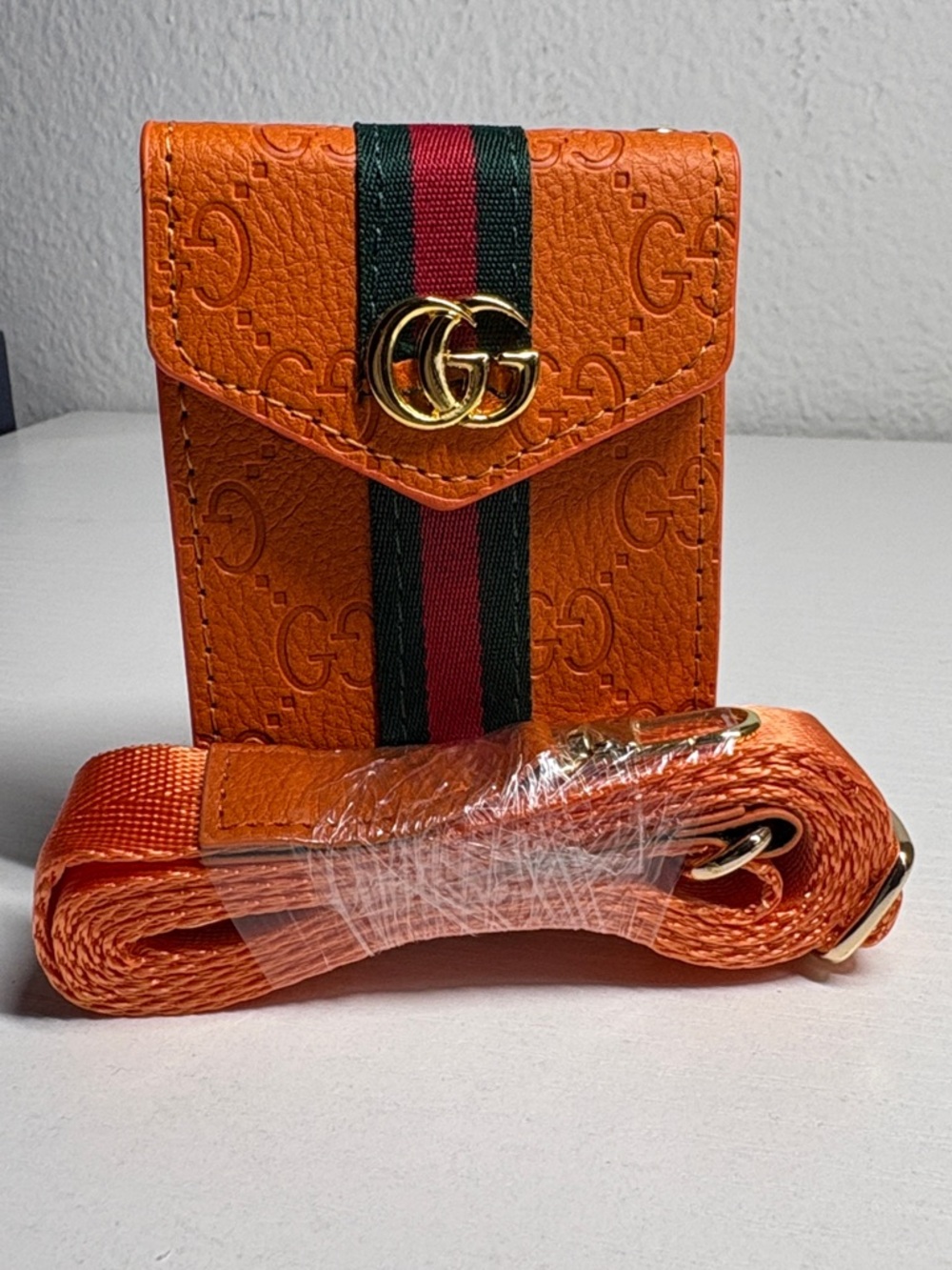 Orange crossbody Embossed card Pouch with Web Stripe